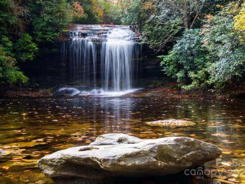 193 Falls View Drive, Lake Toxaway, NC 28747.  MLS# CAR4267831, YatesRealty ID 24289. Experience the many nearby waterfalls