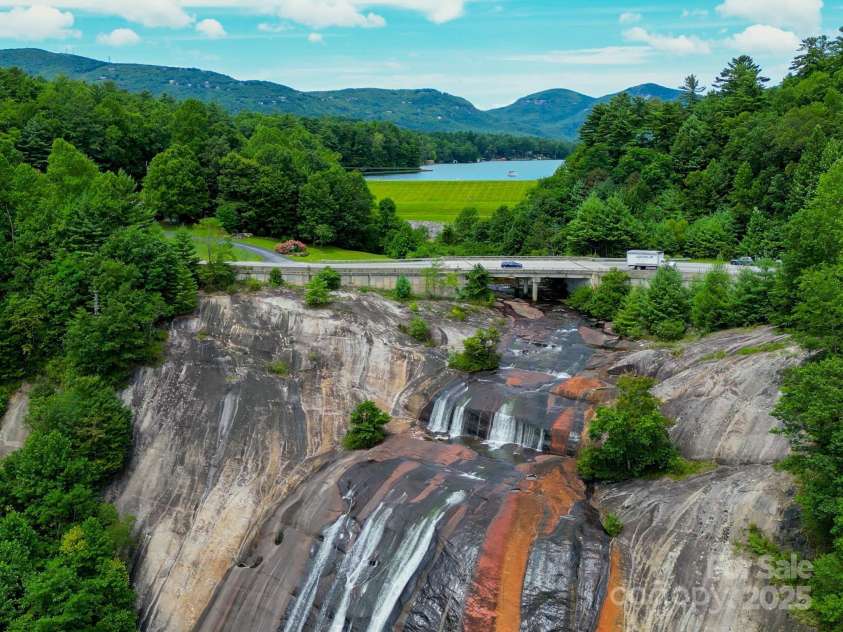 193 Falls View Drive, Lake Toxaway, NC 28747.  MLS# CAR4267831, YatesRealty ID 24289. Toxaway Falls & Lake Toxaway