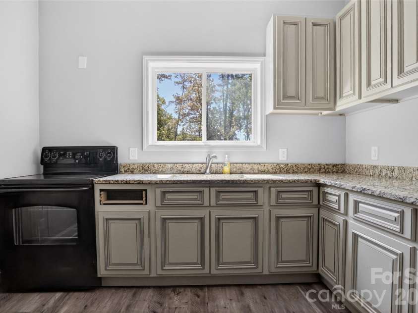 6151 Settlers Trail, Stanfield, NC 28163.  MLS# CAR4378907, YatesRealty ID 24291. Basement Kitchen