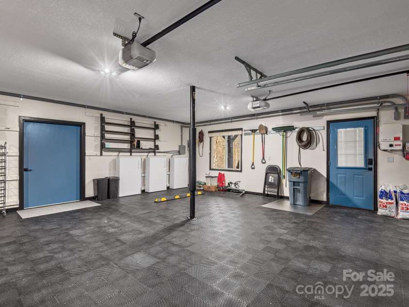 1591 Chestnut Flats Lane, Waynesville, NC 28786.  MLS# CAR4330210, YatesRealty ID 24293. Large 3 Car Garage