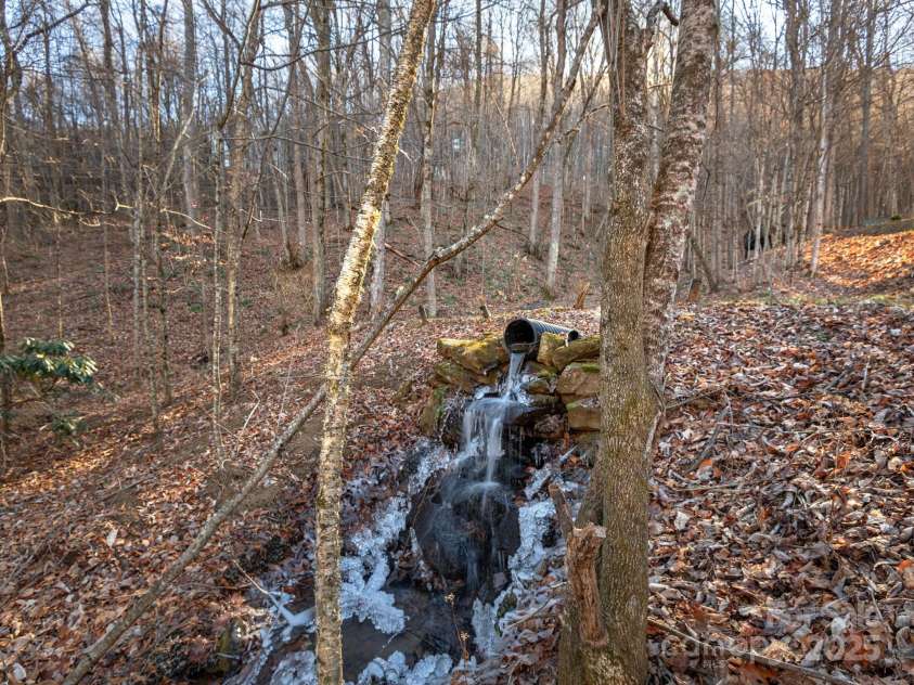 1591 Chestnut Flats Lane, Waynesville, NC 28786.  MLS# CAR4330210, YatesRealty ID 24293. Natural Spring provides the Ultimate Mountain Relaxation