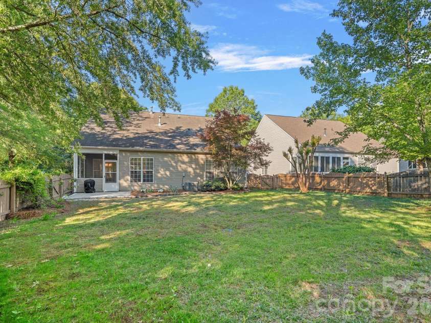 6902 Saranac Lane, Matthews, NC 28105.  MLS# CAR4368511, YatesRealty ID 24299. Fenced Backyard