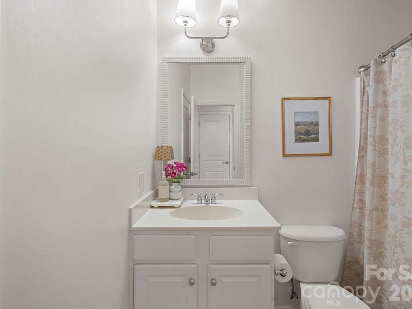 6902 Saranac Lane, Matthews, NC 28105.  MLS# CAR4368511, YatesRealty ID 24299.  First Floor Guest Bathroom