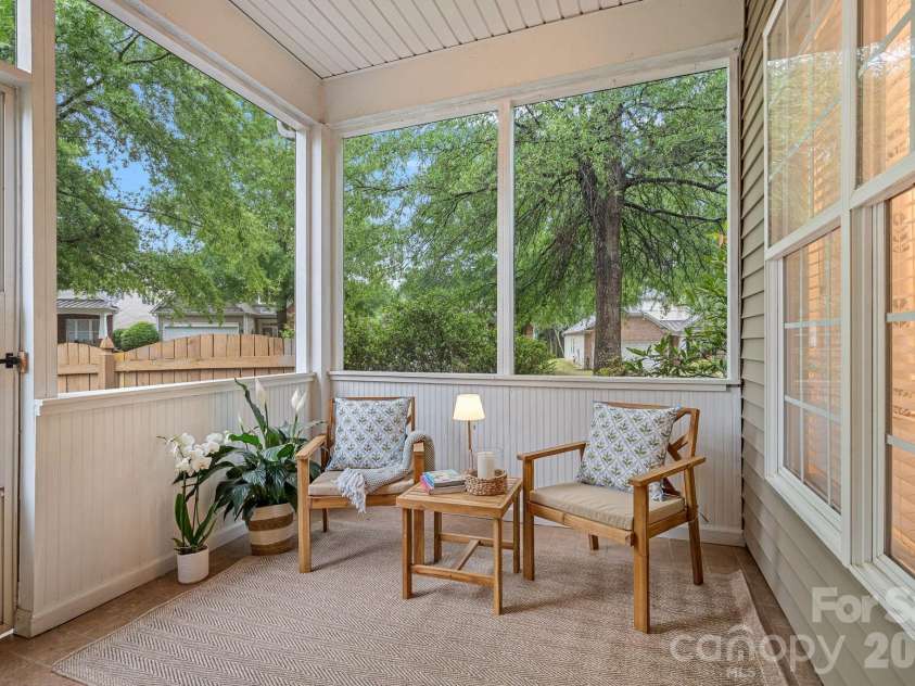 6902 Saranac Lane, Matthews, NC 28105.  MLS# CAR4368511, YatesRealty ID 24299. Screened Back Porch