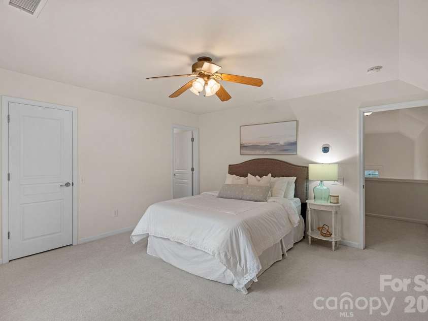 6902 Saranac Lane, Matthews, NC 28105.  MLS# CAR4368511, YatesRealty ID 24299. Second Floor Bedroom
