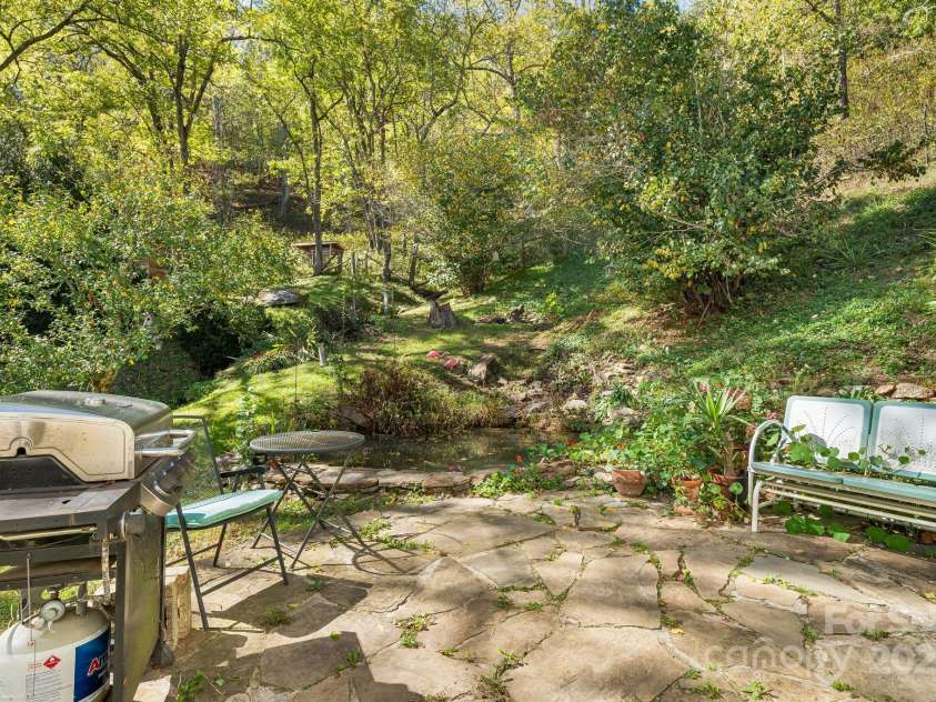 3942 Anderson Branch Road, Marshall, NC 28753.  MLS# CAR4194883, YatesRealty ID 243. Enjoy your coffee on the patio next to the Koi pond