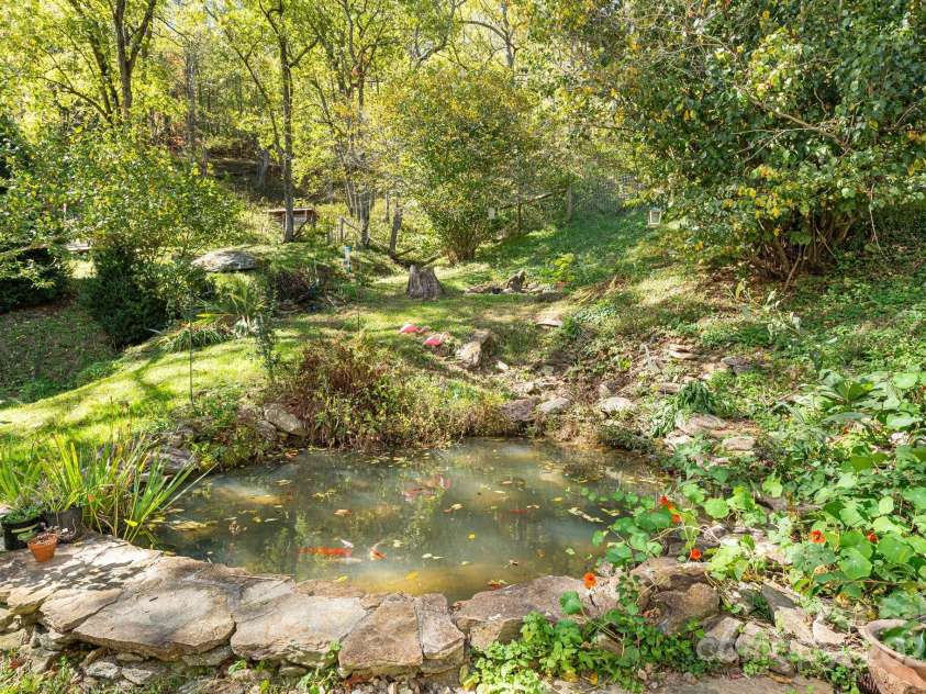 3942 Anderson Branch Road, Marshall, NC 28753.  MLS# CAR4194883, YatesRealty ID 243. Koi pond
