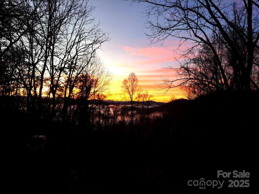 3942 Anderson Branch Road, Marshall, NC 28753.  MLS# CAR4194883, YatesRealty ID 243. Sunrise from your porch.
