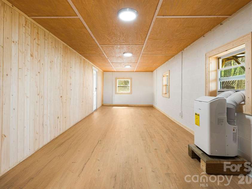 120 Wilderness Drive, Weaverville, NC 28787.  MLS# CAR4349066, YatesRealty ID 2430. Conditioned 500 sf Workshop