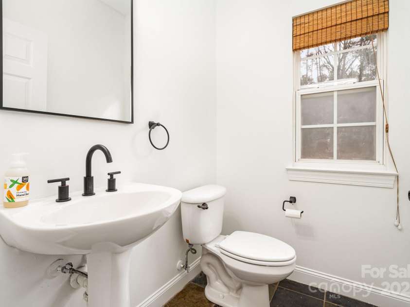 5672 Wrenfield Court, Charlotte, NC 28277.  MLS# CAR4228476, YatesRealty ID 24301. Half Bath- Downstairs