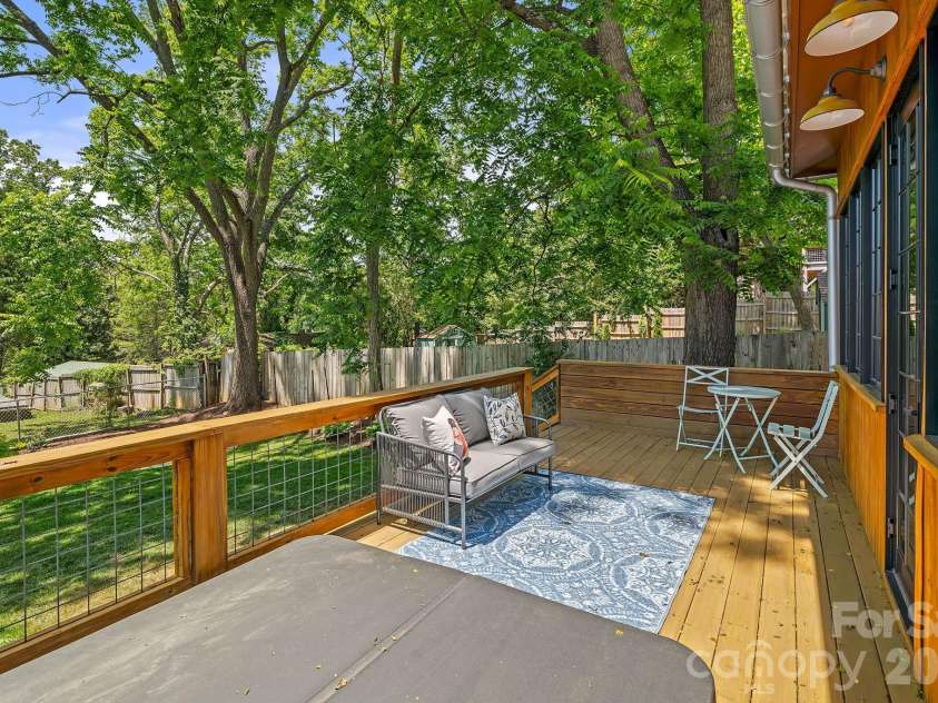 77 Middlemont Avenue, Asheville, NC 28806.  MLS# CAR4383385, YatesRealty ID 24301. Expansive Back Deck