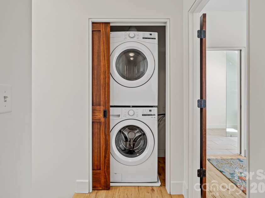 77 Middlemont Avenue, Asheville, NC 28806.  MLS# CAR4383385, YatesRealty ID 24301. Upper level stackable Washer/Dryer