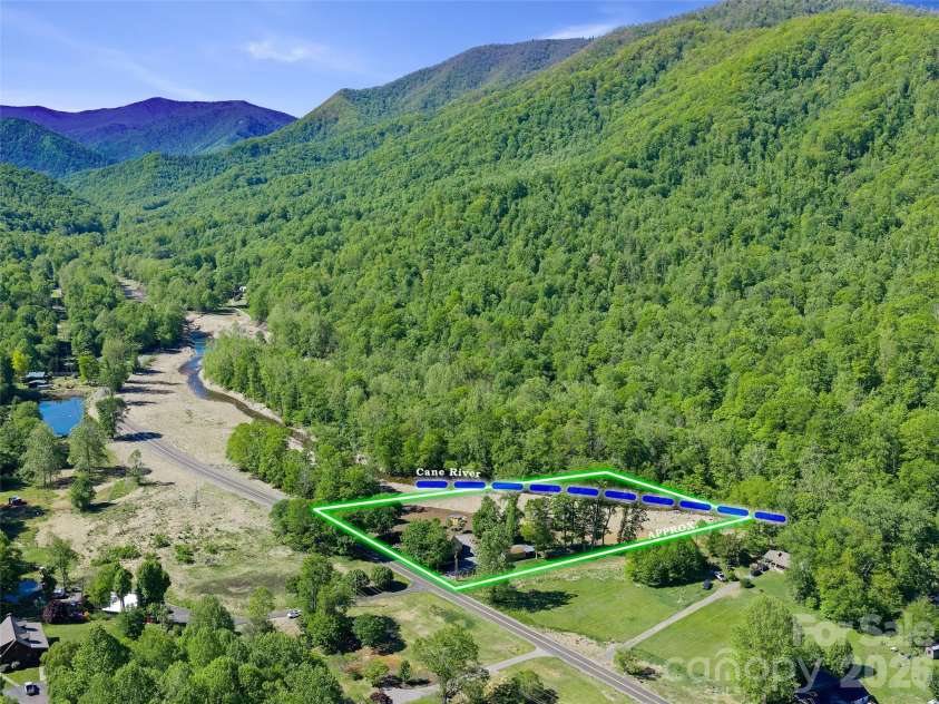 326 Ewart Wilson Road, Burnsville, NC 28714.  MLS# CAR4380347, YatesRealty ID 24308. Borders state land