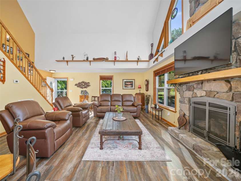326 Ewart Wilson Road, Burnsville, NC 28714.  MLS# CAR4380347, YatesRealty ID 24308. Cozy fire