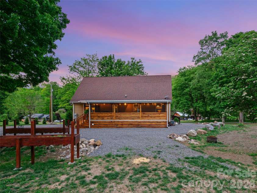 326 Ewart Wilson Road, Burnsville, NC 28714.  MLS# CAR4380347, YatesRealty ID 24308. Grass growing now