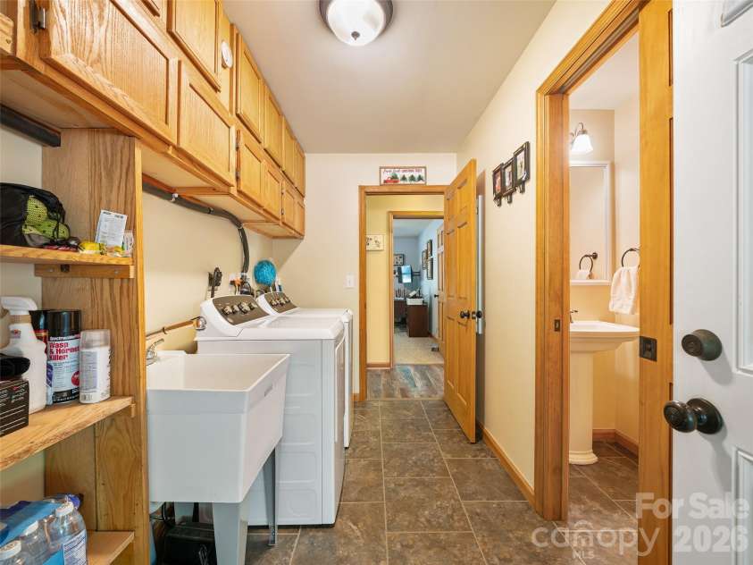 326 Ewart Wilson Road, Burnsville, NC 28714.  MLS# CAR4380347, YatesRealty ID 24308. Utility room/bath