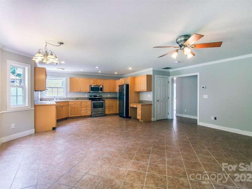 23 Allen Avenue, Asheville, NC 28803.  MLS# CAR4267376, YatesRealty ID 24311. Lots of storage in the kitchen and a large panty to the right
