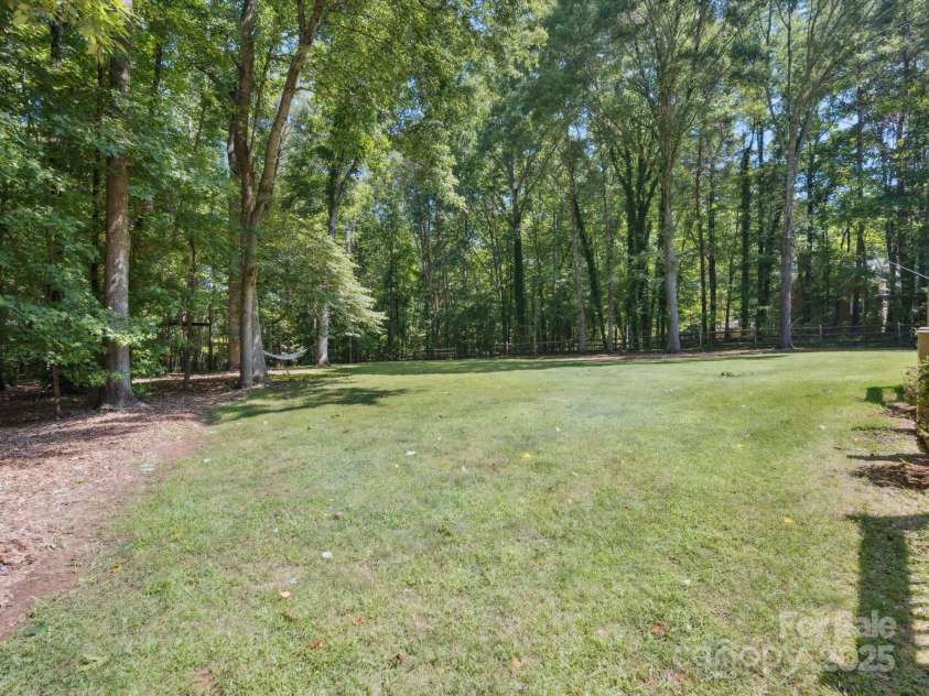3701 Bounty Court, Matthews, NC 28104.  MLS# CAR4275377, YatesRealty ID 24313. 