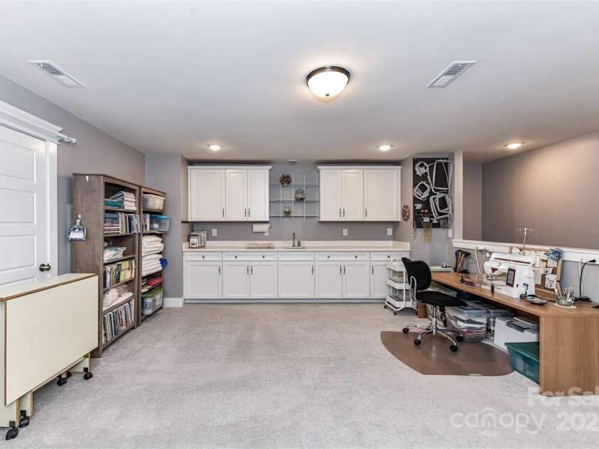 5129 Devonshire Road, Denver, NC 28037.  MLS# CAR4275511, YatesRealty ID 24318. Large Loft/Bonus with sink, plenty of cabinets for storage & counter/work space!