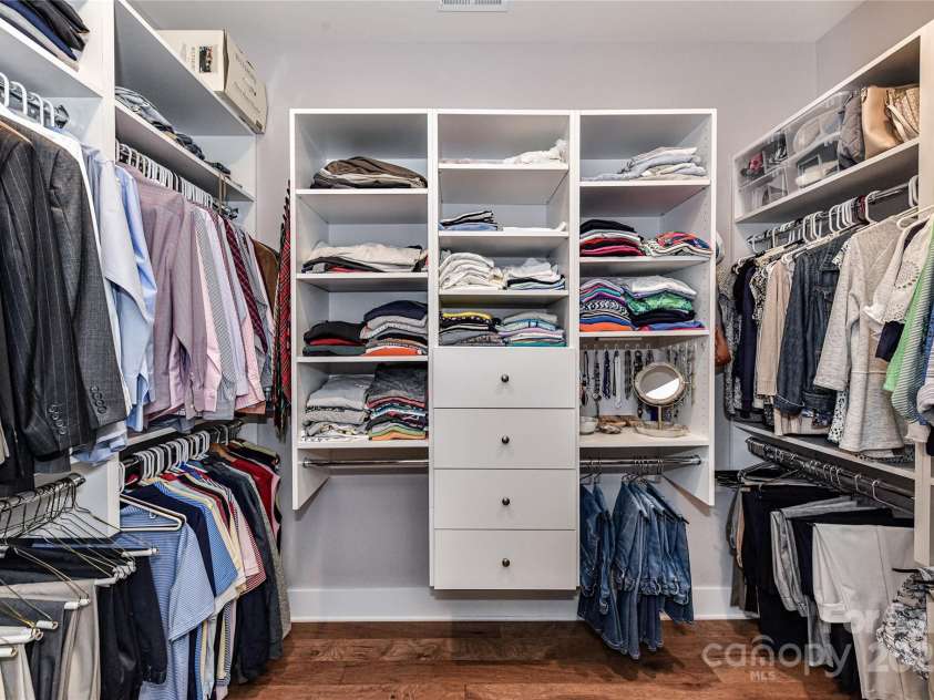 5129 Devonshire Road, Denver, NC 28037.  MLS# CAR4275511, YatesRealty ID 24318. Large Walk In Primary Closet with custom shelving/cabinets for storage!