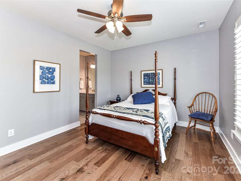 5129 Devonshire Road, Denver, NC 28037.  MLS# CAR4275511, YatesRealty ID 24318. Spacious Bedroom 3 on main with plantation shutters, ceiling fan/light, hardwood floors & Jack & Jill Bath!