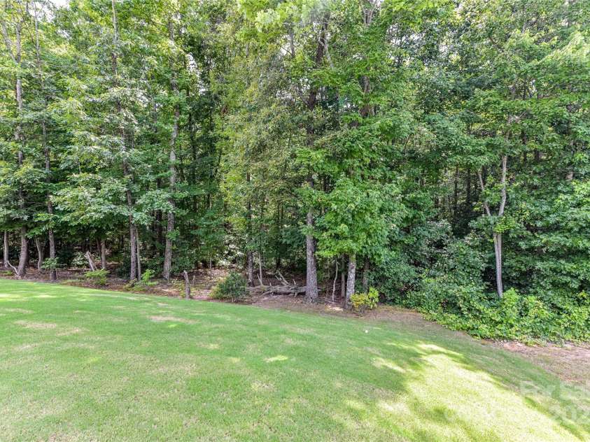 5129 Devonshire Road, Denver, NC 28037.  MLS# CAR4275511, YatesRealty ID 24318. Wooded Back Yard!