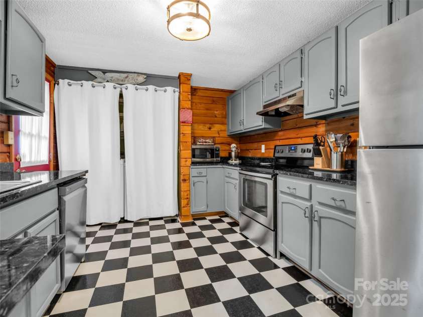 116 Chalet Road, Lake Lure, NC 28746.  MLS# CAR4277380, YatesRealty ID 24319. 