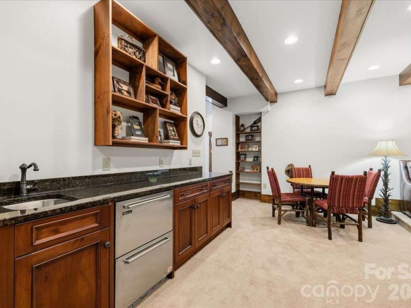 5140 Beech Bluff Drive, Morganton, NC 28655.  MLS# CAR4420970, YatesRealty ID 2432. Basement den media room wet bar
