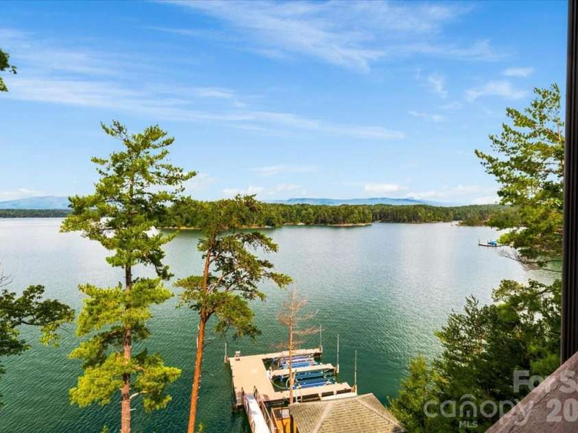 5140 Beech Bluff Drive, Morganton, NC 28655.  MLS# CAR4420970, YatesRealty ID 2432. View with private boat dock and lifts