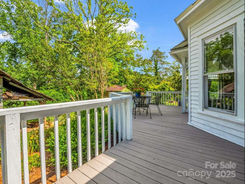 1111 Bills Creek Road, Lake Lure, NC 28746.  MLS# CAR4273811, YatesRealty ID 24320. Kitchen side of deck