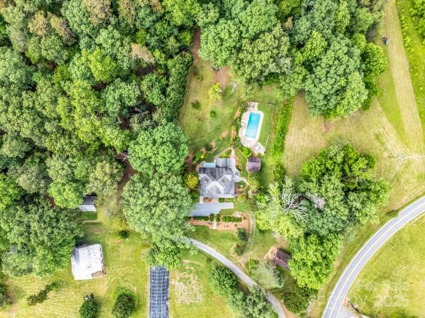 1111 Bills Creek Road, Lake Lure, NC 28746.  MLS# CAR4273811, YatesRealty ID 24320. Overhead shot from drone