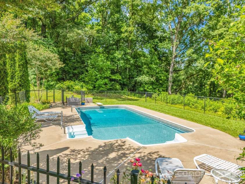 1111 Bills Creek Road, Lake Lure, NC 28746.  MLS# CAR4273811, YatesRealty ID 24320. Pool view