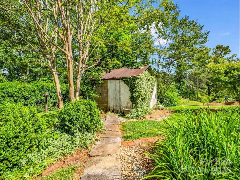 1111 Bills Creek Road, Lake Lure, NC 28746.  MLS# CAR4273811, YatesRealty ID 24320. Small shed
