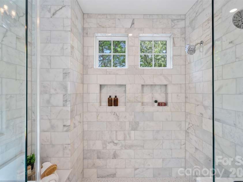 709 Norris Avenue, Charlotte, NC 28206.  MLS# CAR4380495, YatesRealty ID 24324. Oversized tile shower with bench and dual niches