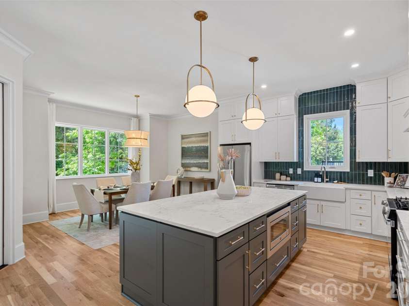 709 Norris Avenue, Charlotte, NC 28206.  MLS# CAR4380495, YatesRealty ID 24324. Statement island & designer lighting