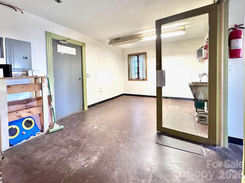 297 Hillside Street, Asheville, NC 28801.  MLS# CAR4326761, YatesRealty ID 2433. 1st floor bedroom/office