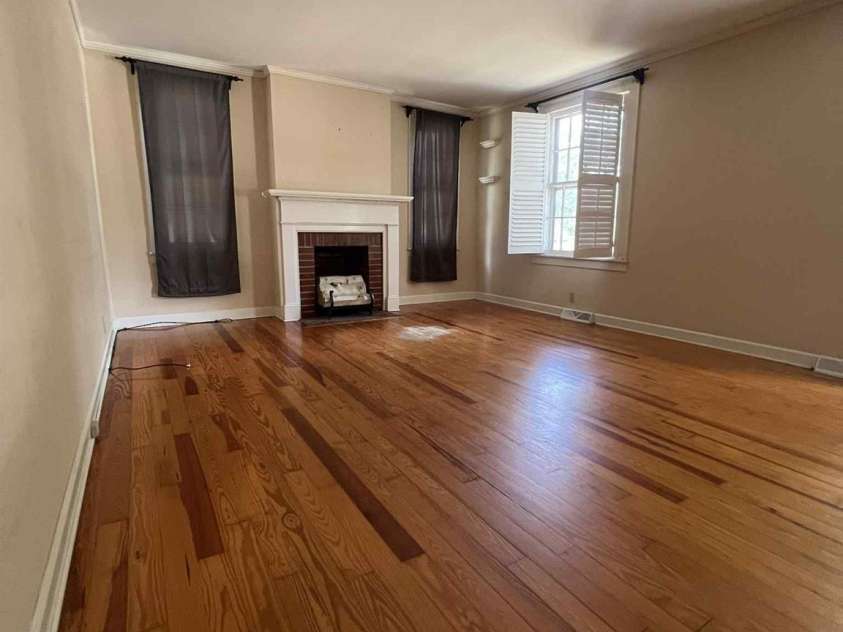 651 Still Street, Chester, SC 29706.  MLS# CAR4287428, YatesRealty ID 2433. Living room with fireplace