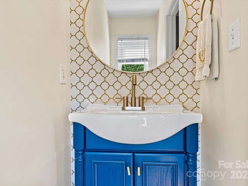 454 Eastway Drive, Troutman, NC 28166.  MLS# CAR4263950, YatesRealty ID 24330. 1/2 bath in bonus room which serves as primary bathroom.