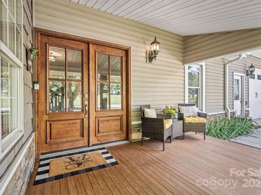 454 Eastway Drive, Troutman, NC 28166.  MLS# CAR4263950, YatesRealty ID 24330. Beautiful covered front entry way.