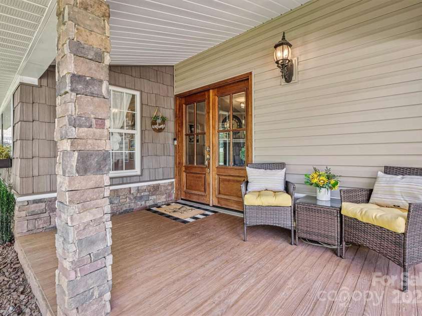 454 Eastway Drive, Troutman, NC 28166.  MLS# CAR4263950, YatesRealty ID 24330. Beautiful covered front entry way.