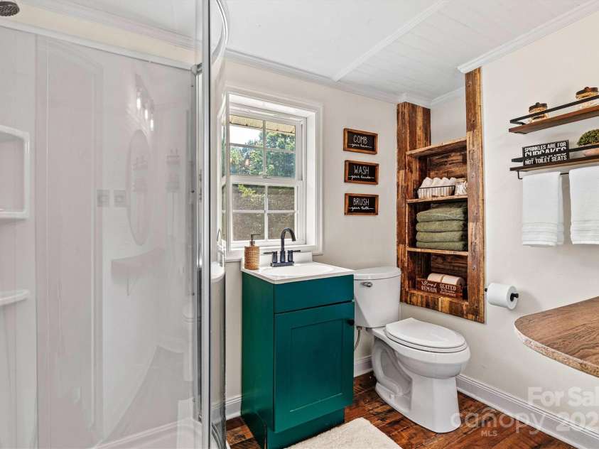 454 Eastway Drive, Troutman, NC 28166.  MLS# CAR4263950, YatesRealty ID 24330. Full bathroom on main level.