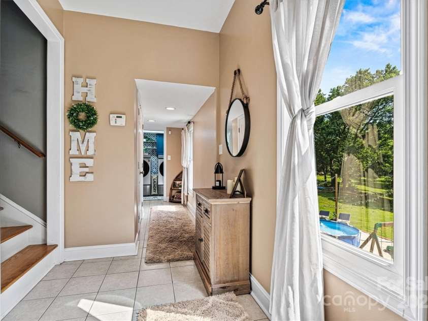 454 Eastway Drive, Troutman, NC 28166.  MLS# CAR4263950, YatesRealty ID 24330. Hallway on main level.