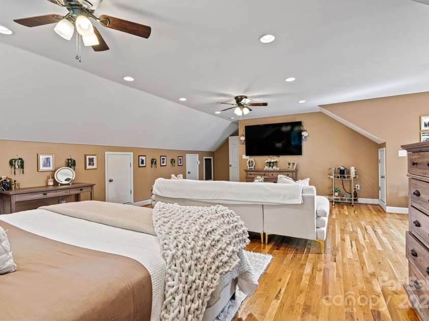 454 Eastway Drive, Troutman, NC 28166.  MLS# CAR4263950, YatesRealty ID 24330. Primary bedroom in upstairs bonus room with 1/2 bath.