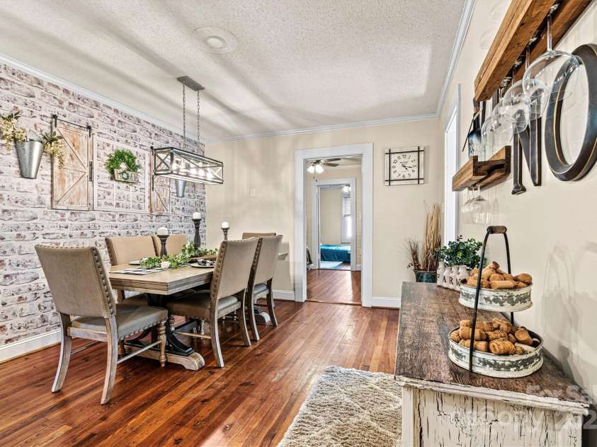 454 Eastway Drive, Troutman, NC 28166.  MLS# CAR4263950, YatesRealty ID 24330. Spacious dining area with beautiful wood flooring.