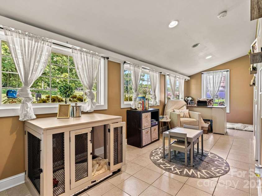 454 Eastway Drive, Troutman, NC 28166.  MLS# CAR4263950, YatesRealty ID 24330. Sunroom.