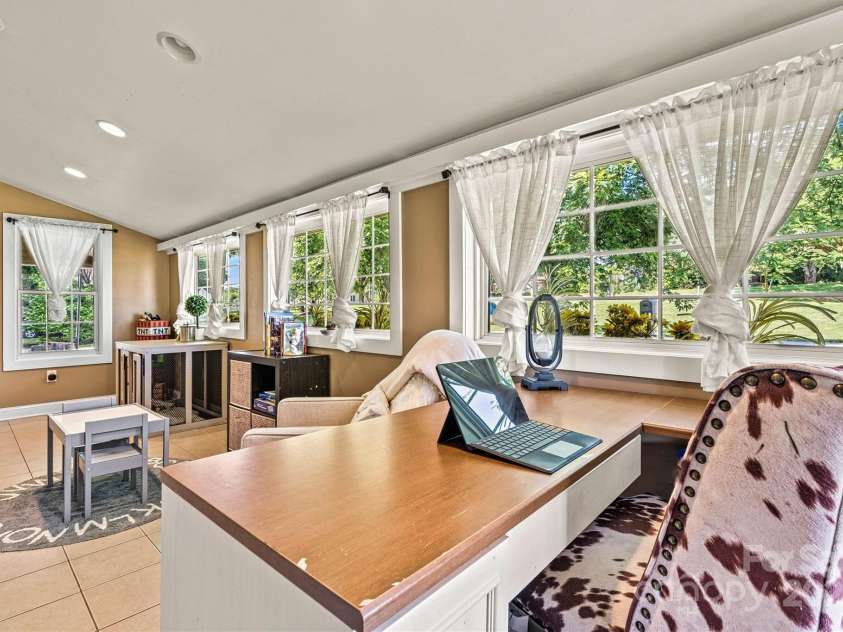 454 Eastway Drive, Troutman, NC 28166.  MLS# CAR4263950, YatesRealty ID 24330. Sunroom.