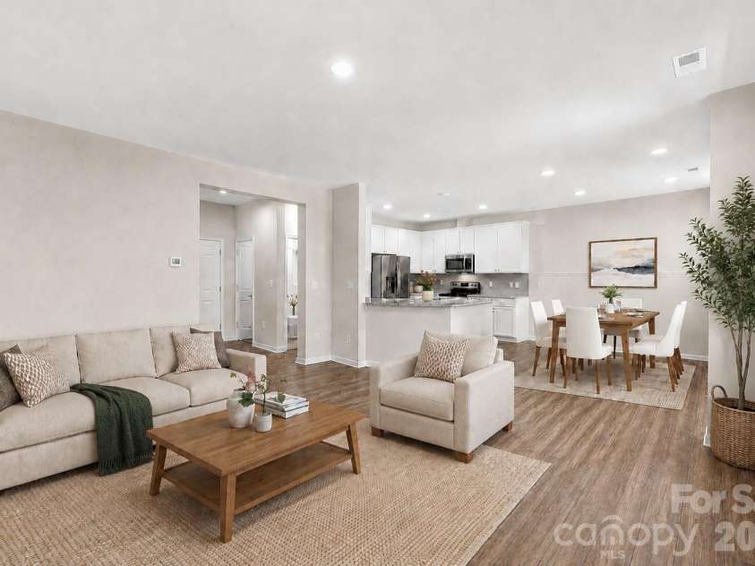 13016 Lannister Drive, Charlotte, NC 28278.  MLS# CAR4382497, YatesRealty ID 24334. Living Room - Open Layout - Virtually Staged
