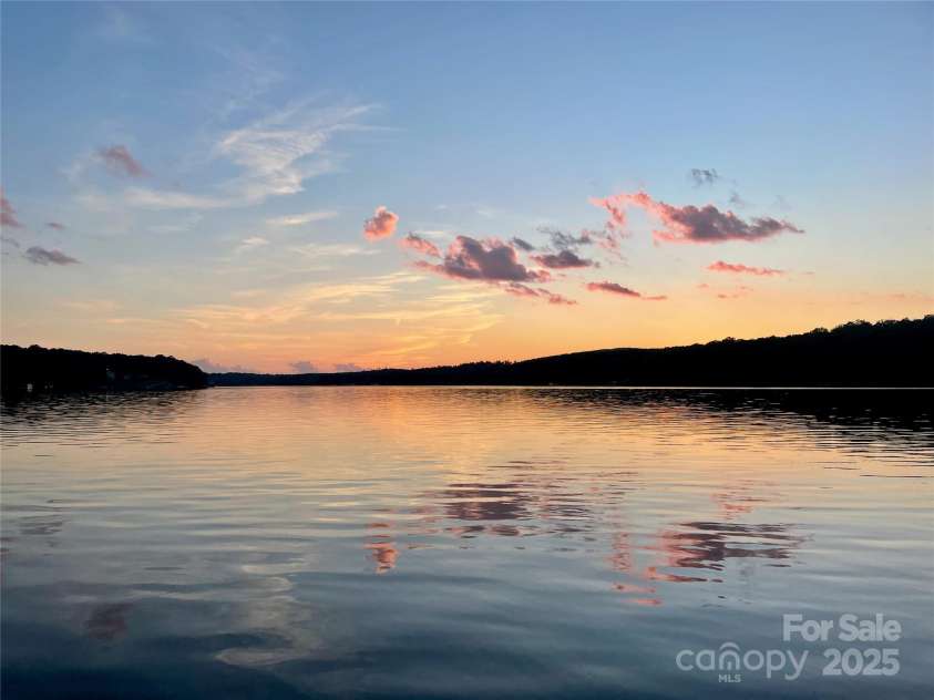248 Pioneer Drive, Mount Gilead, NC 27306.  MLS# CAR4266020, YatesRealty ID 24336. Lake Tillery has breathtaking sunsets - you can take your boat down to the community boat ramp to access Lake Tillery.
