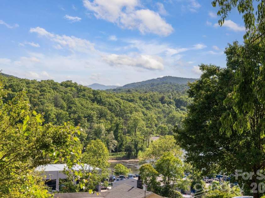 66 Green Oak Road, Asheville, NC 28804.  MLS# CAR4371063, YatesRealty ID 24337. Summer River views