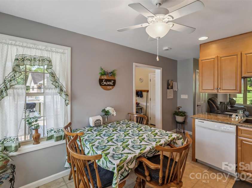 862 Asbury Road, Candler, NC 28715.  MLS# CAR4275719, YatesRealty ID 24339. Kitchen with dining area